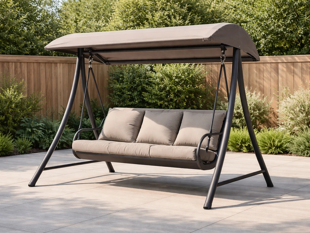 Canopy-covered cushioned patio swing with stand in a quiet backyard patio setting.
